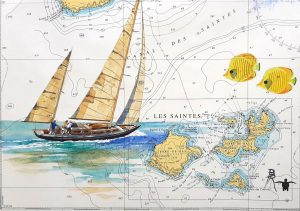 Peinture sur une authentique carte marine des Saintes, avec un voilier en mer et des petits poissons, réalisée à l'aquarelle par Bertrand Rouby